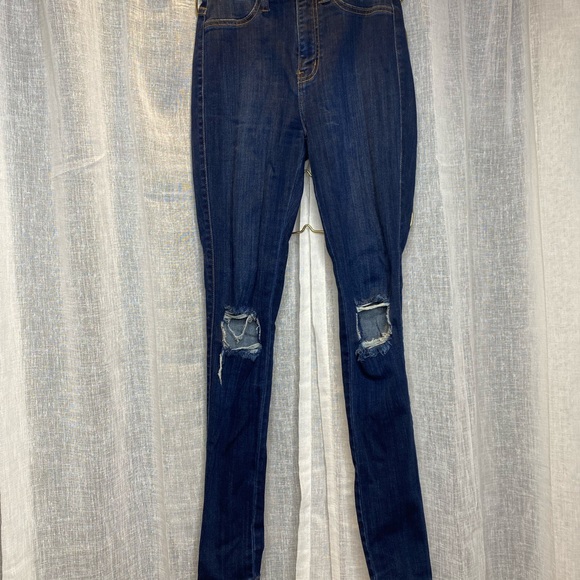 BLUE JEANS WITH KNEE RIPS - Picture 1 of 1